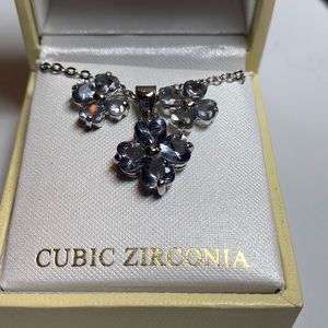 Cubic Zirconia necklace with matching earrings, silver tone.